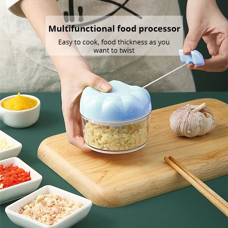 Kitchen Job - Presse-ail manuel bleu/rose, 1 pièce, traction